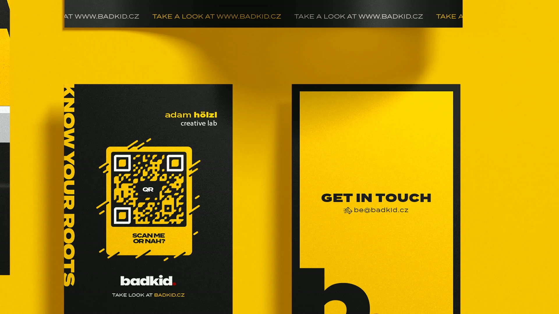 badkid business cards on yellow: a black card with a QR code and the badkid wordmark, and a get in touch card