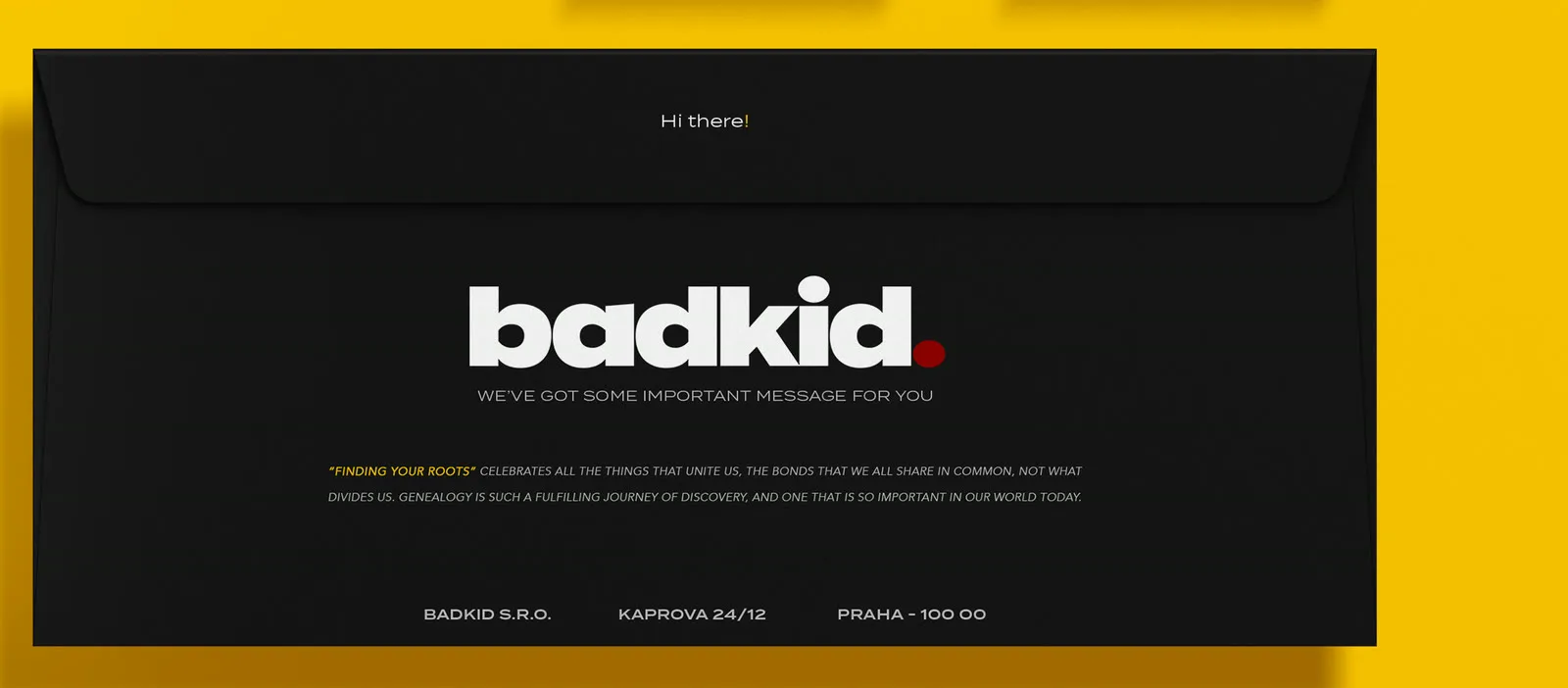 Black badkid envelope with the white wordmark and oxblood full stop on a yellow surface