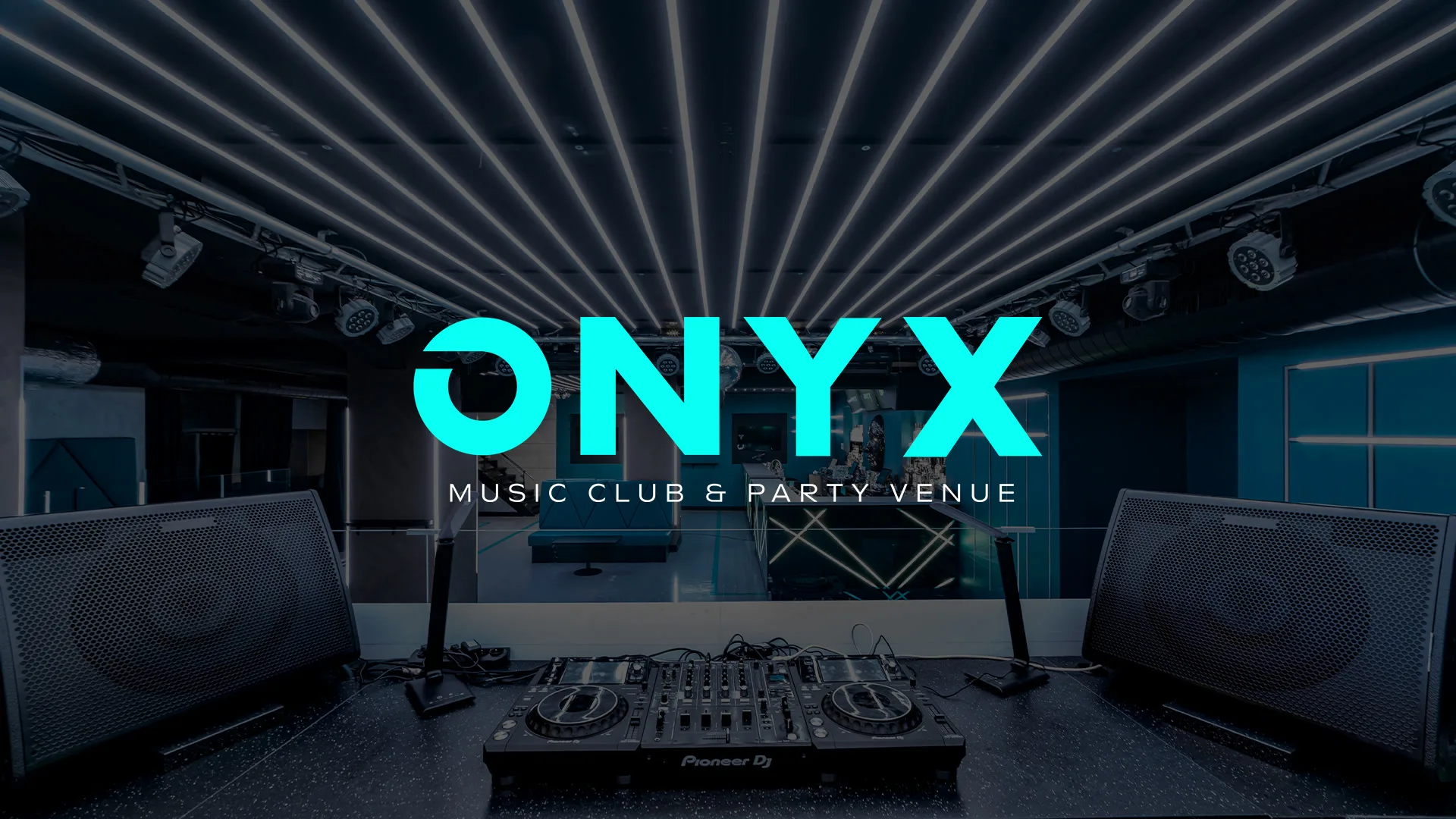 The ONYX bar: a black mask on the wall between three screens carrying the wordmark