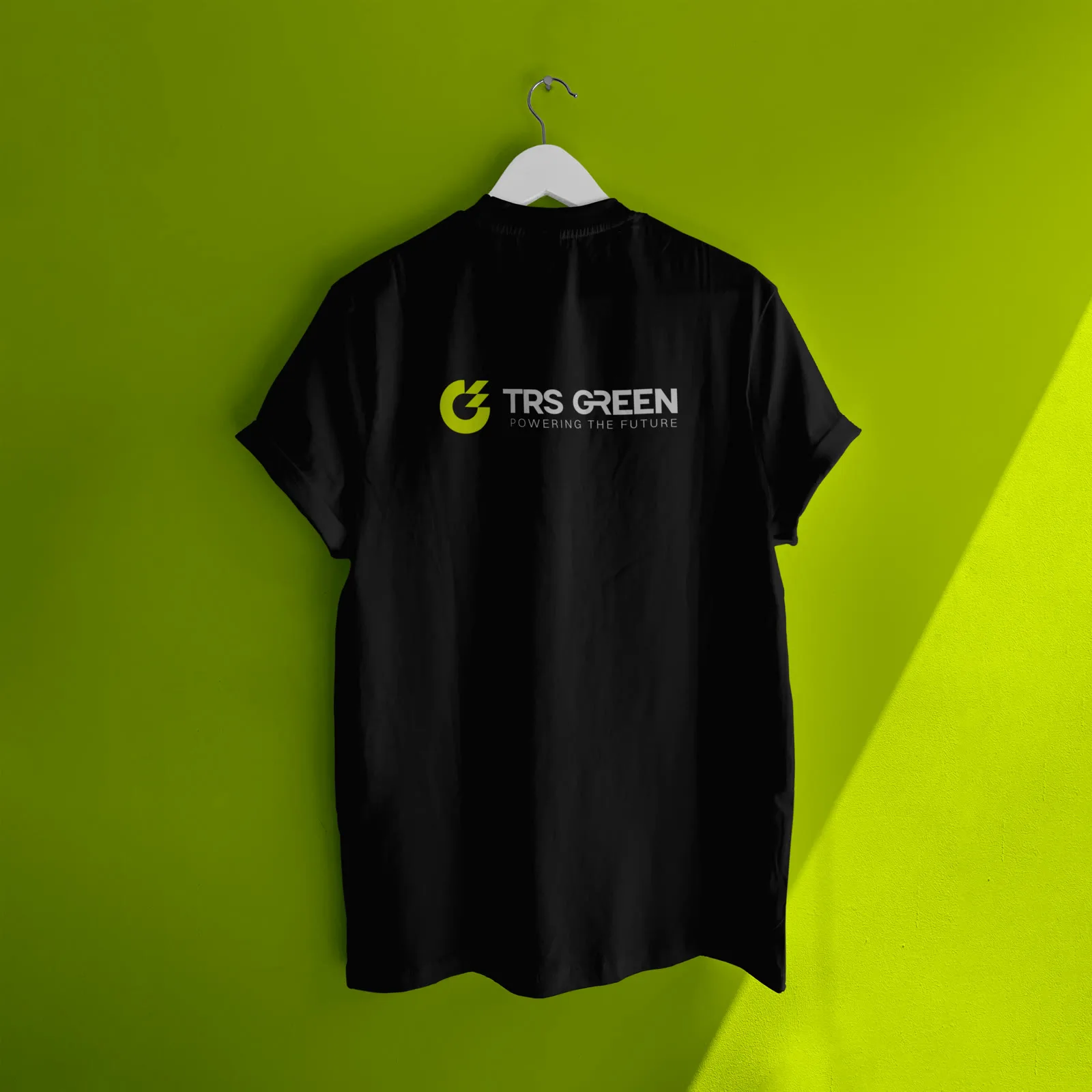 Black TRS Green t-shirt with the small white lockup between the shoulders